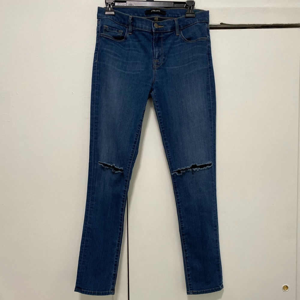 J Brand Mid Rise Skinny Jean with cuts Size 28